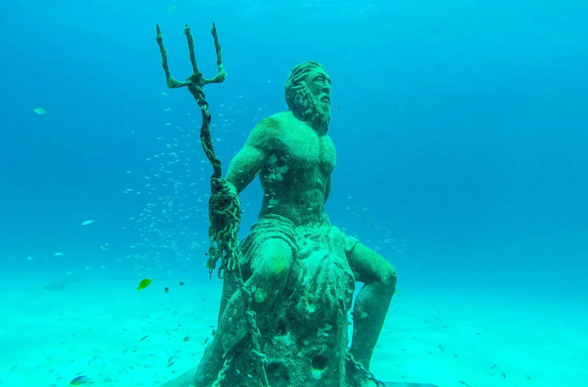 The statue of Poseidon under water, in San Andrés, Colombia