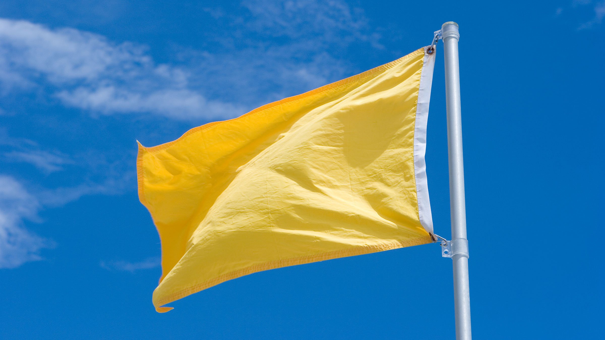 Co znamená žlutá vlajka?
